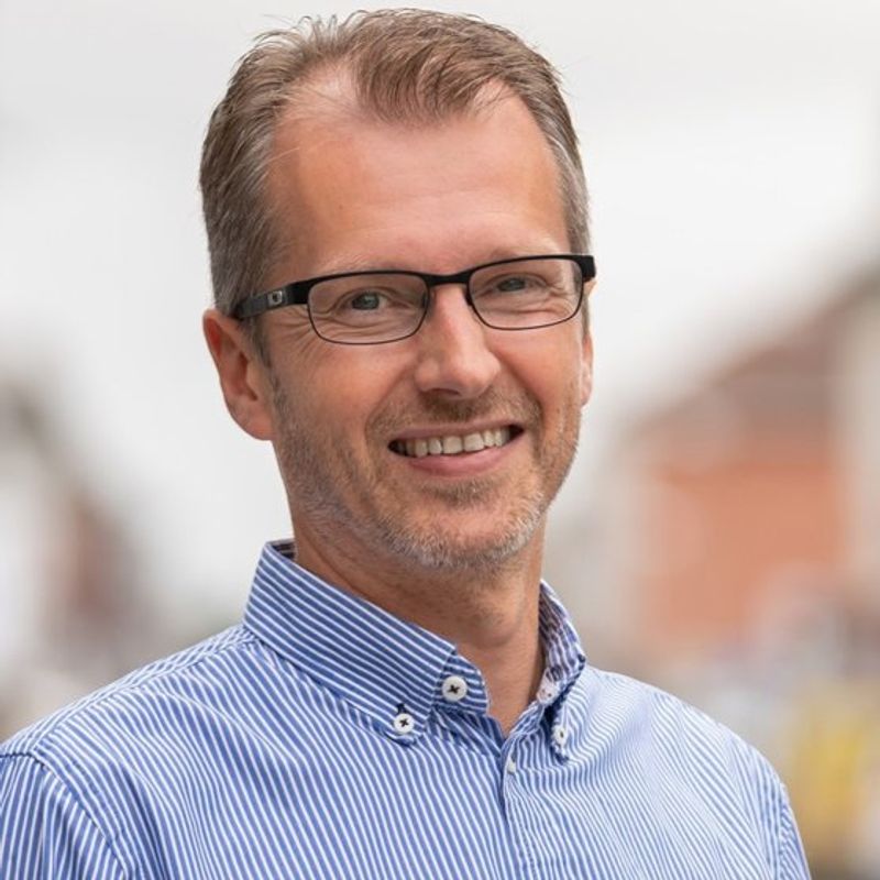 Portrett av eiendomsmegler Jens Olav Jacobsen