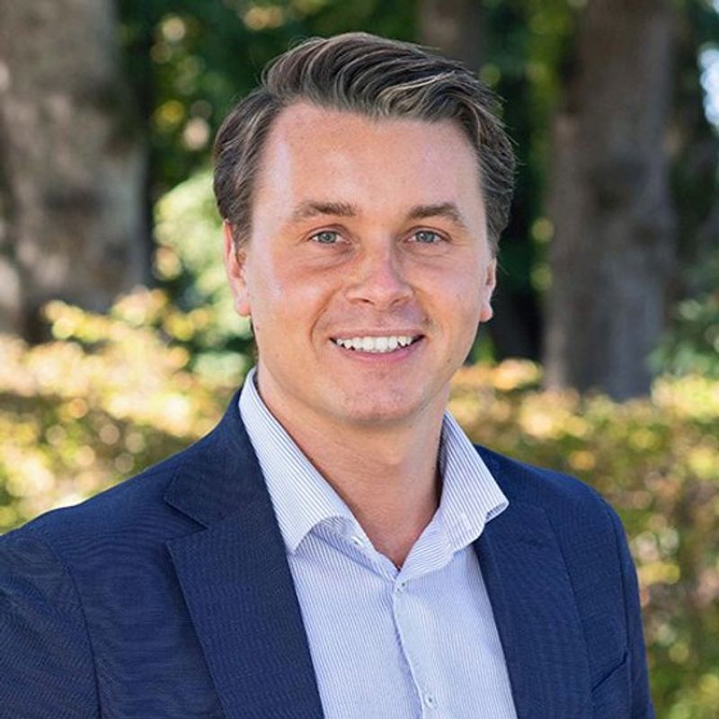 Portrett av eiendomsmegler Nicolai Haug Kristiansen