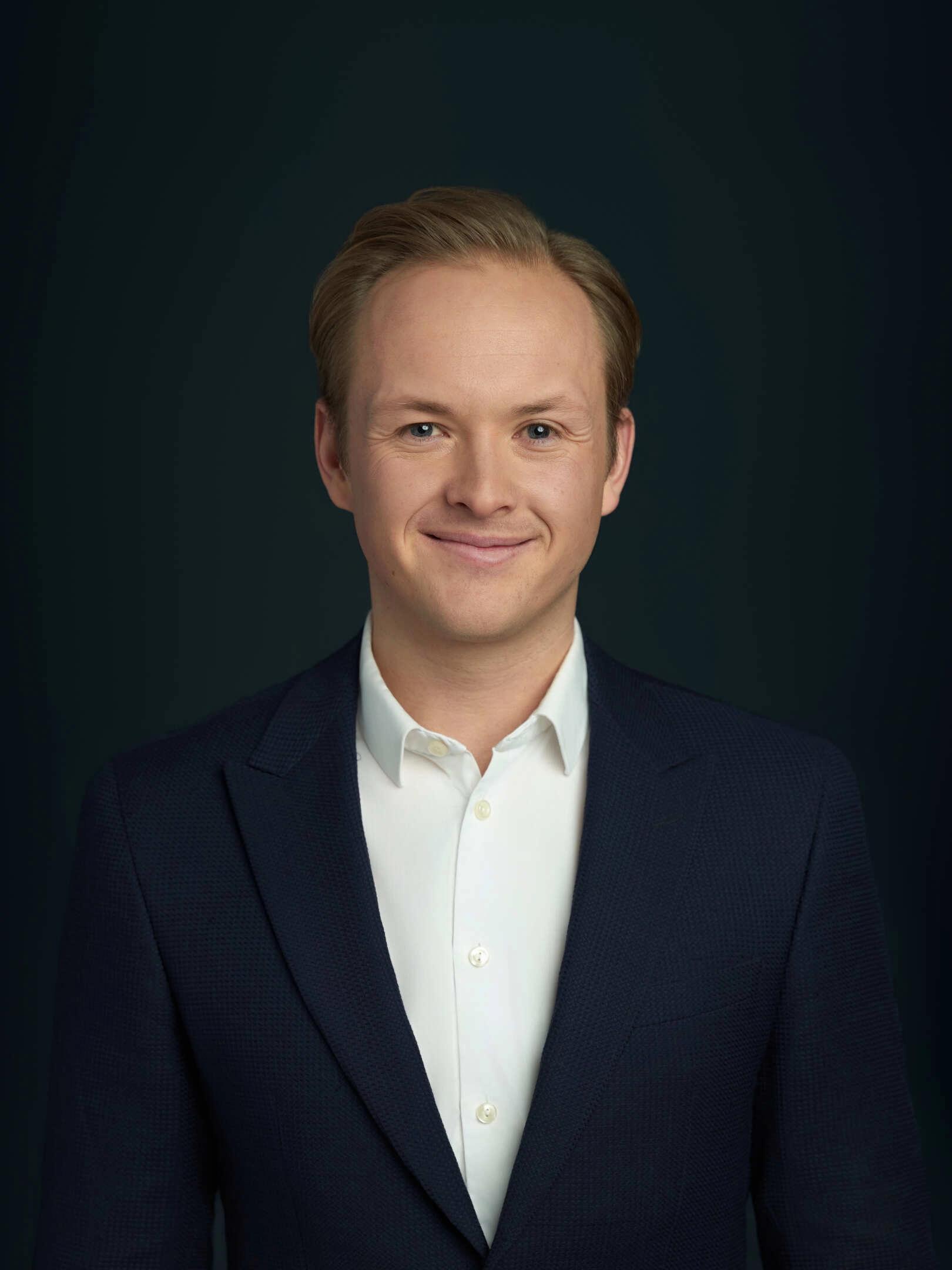 Portrett av eiendomsmeglerfullmektig Martin Brusletto