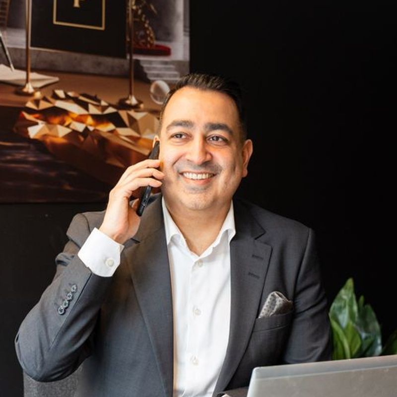 Portrett av eiendomsmegler Amit Sharma