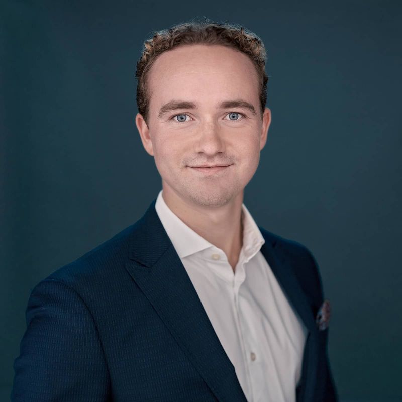 Portrett av eiendomsmegler Marcus Nielsen Rommen