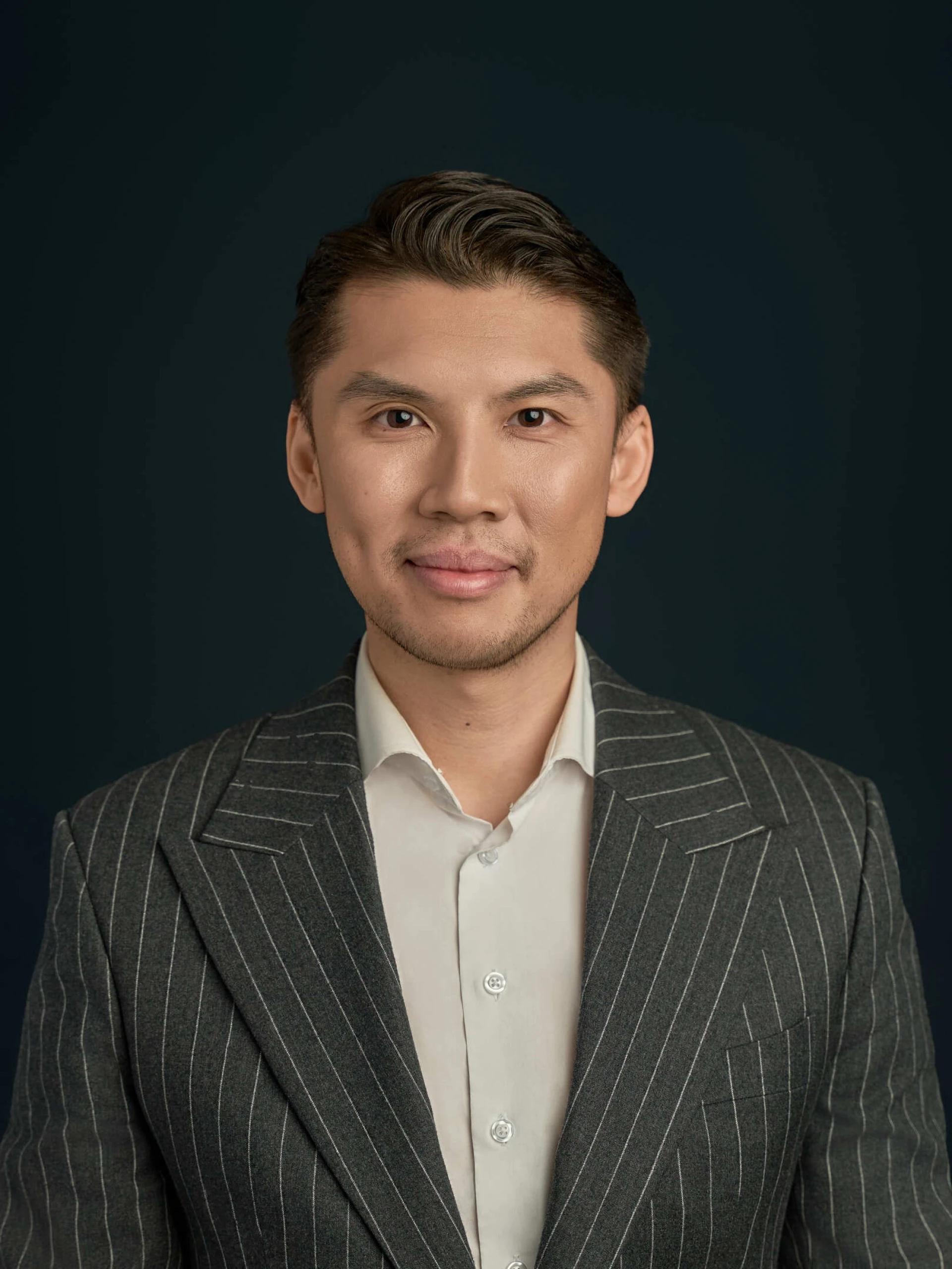 Portrett av eiendomsmegler Duy Vidar Tang