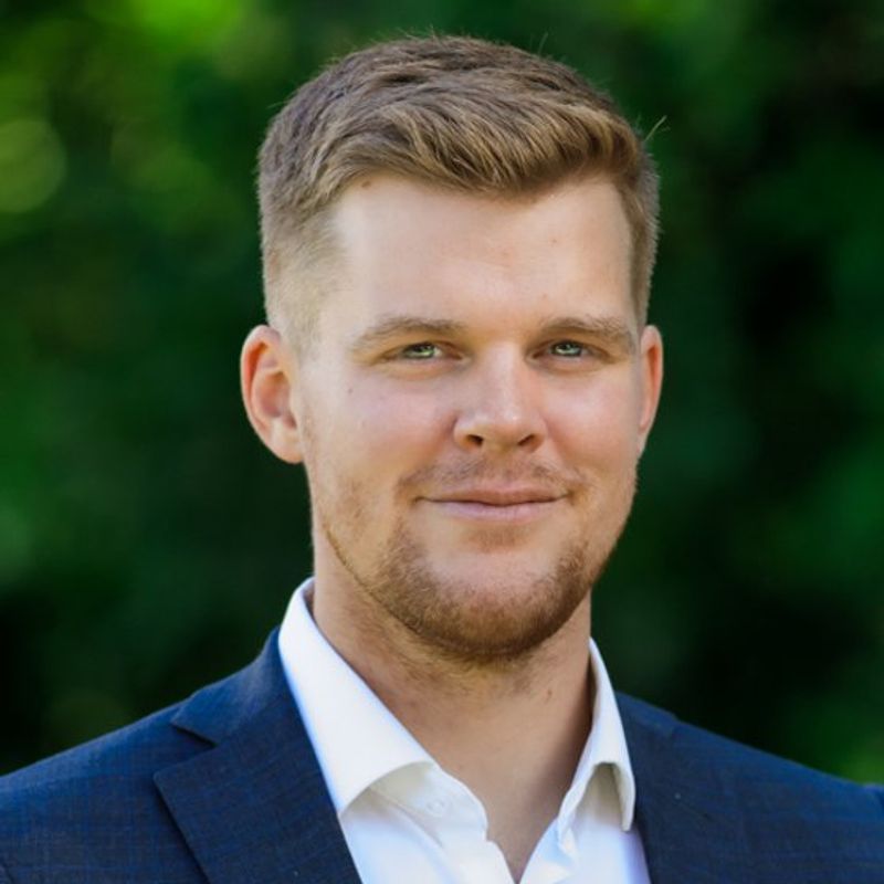 Portrett av eiendomsmegler Kristian Karlsen