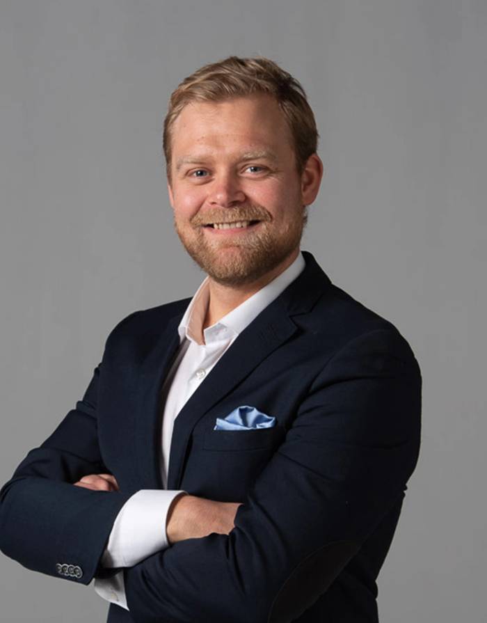 Portrett av eiendomsmegler Christian Blenne Lien