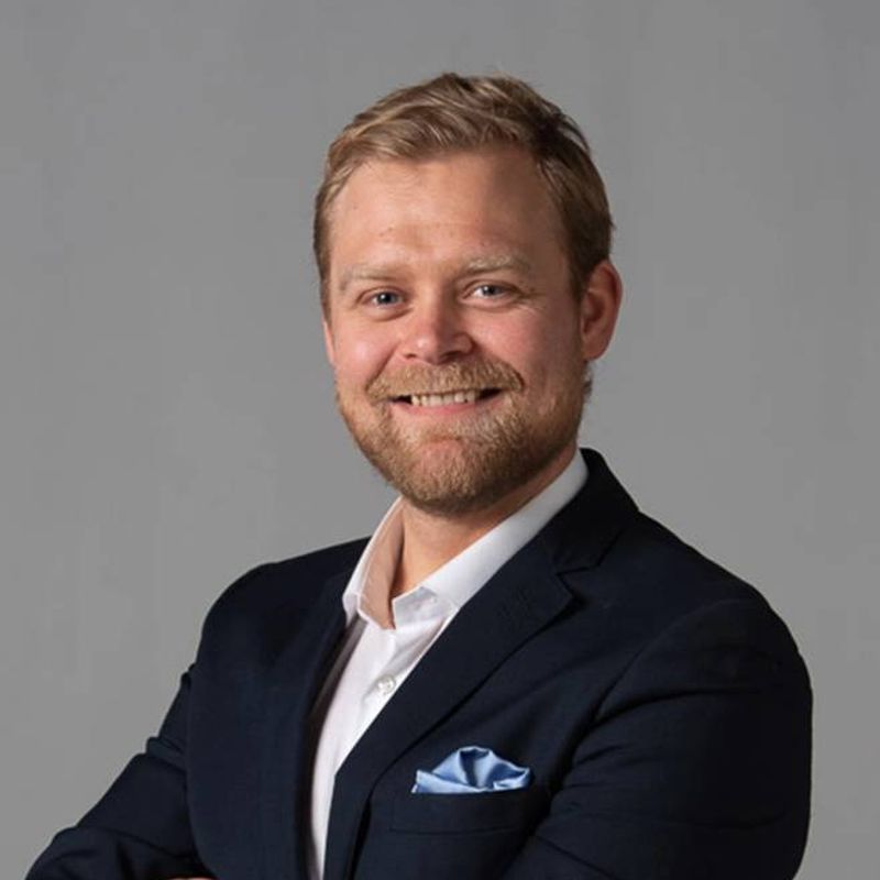 Portrett av eiendomsmegler Christian Blenne Lien