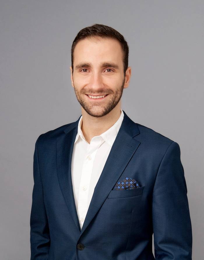Portrett av eiendomsmegler Dominik Zych