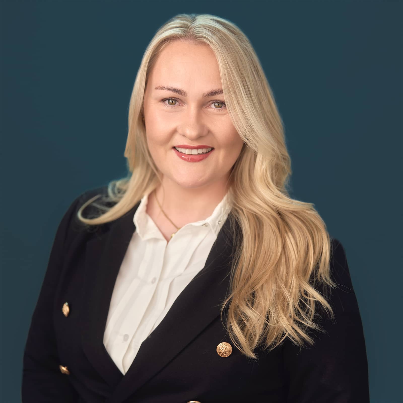 Portrett av eiendomsmegler Camilla Pitz Jacobsen