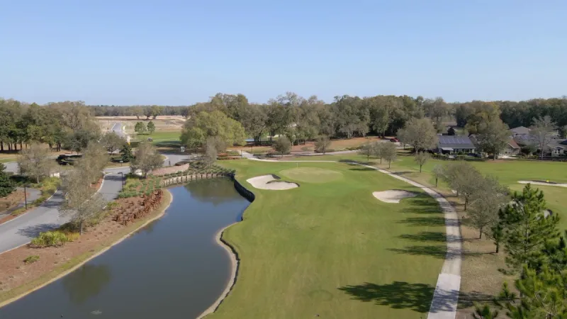 Meticulously maintained golf course  and waterway at Ocala Preserve.