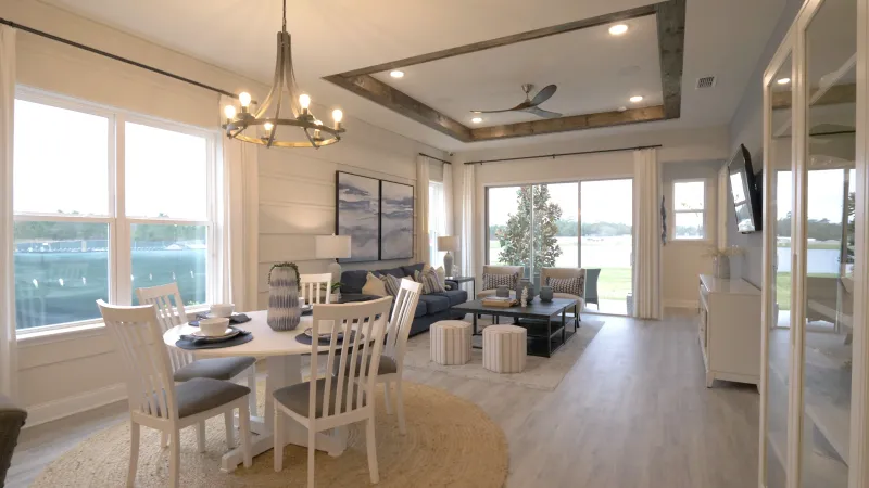 View of a tastefully decorated dining room and living room in a cozy Everlake at Mandarin home.