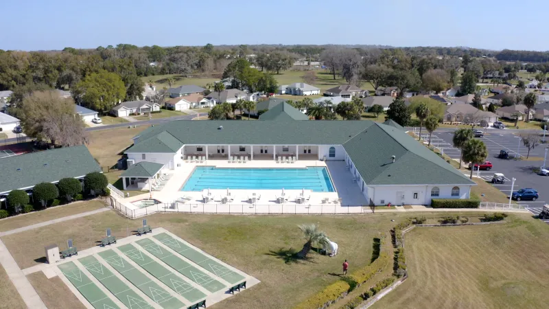 Bocce courts and pool area at community clubhouse.