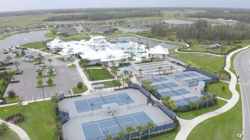Sports courts take the forefront and a beautiful, bright clubhouse is a central hub within the community.