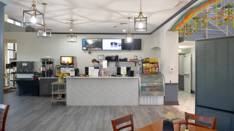 An onsite snack area located in the clubhouse of Sun City Center, offering a diverse selection of drinks and snacks for residents to enjoy during their leisure time.