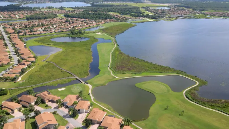 Homes, lakes and water features throughout the Lake Ashton community.