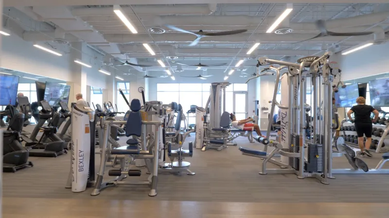 A very well-equipped gym area with an abundance of cardio and weight equipment.