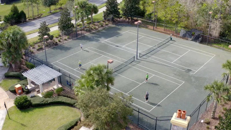 Solivita tennis courts surrounded by landscaping