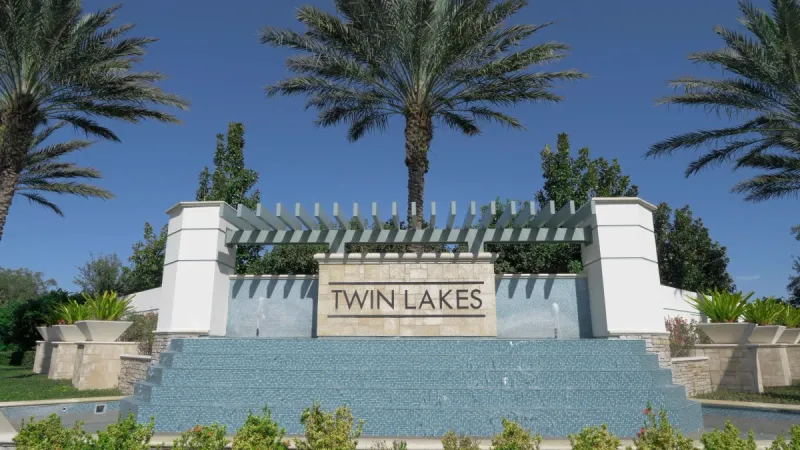 Monument sign and fountain at entrance of Twin Lakes community.