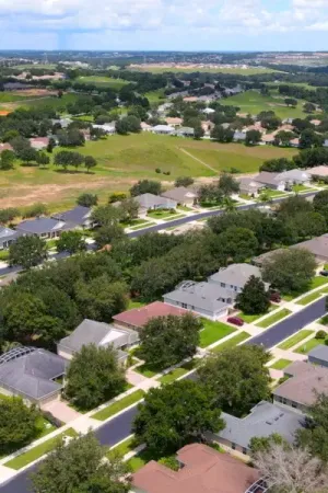 Tree lined streets and homes at Summit Greens.