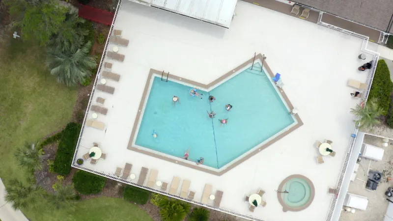 Birdseye view of the pool, spa and lounge areas at Pennbrooke Fairways.