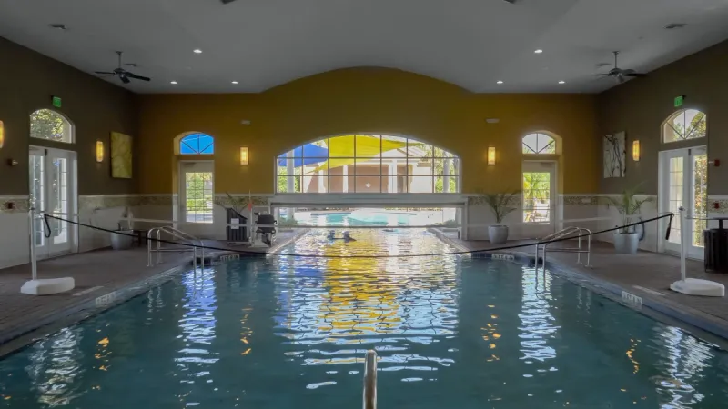 Trilogy Orlando's indoor pool with water volleyball court.