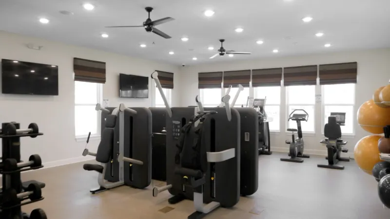 Well appointed fitness center with cardio and weights.