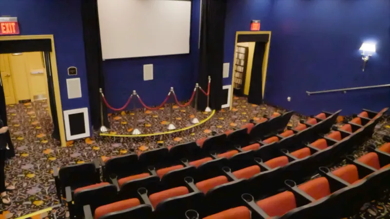 Onsite community cinema offering a movie theater experience