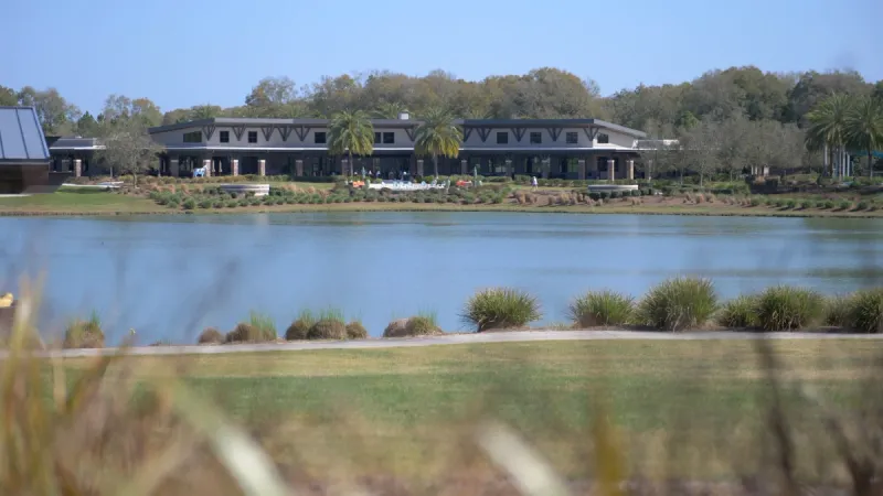 A view of the peaceful lakeside clubhouse at Ocala Preserve.