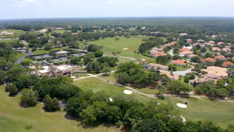 Aerial view of homes, amenities and golf course at The Villages of Citrus Hills.