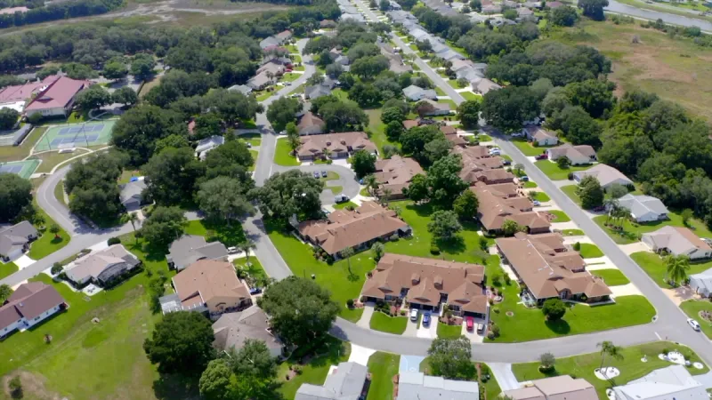 Highland Lakes single family homes and condos on tree lined streets.