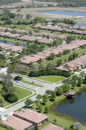 An aerial view of the Del Webb Southshore Falls neighborhood homes of various designs.