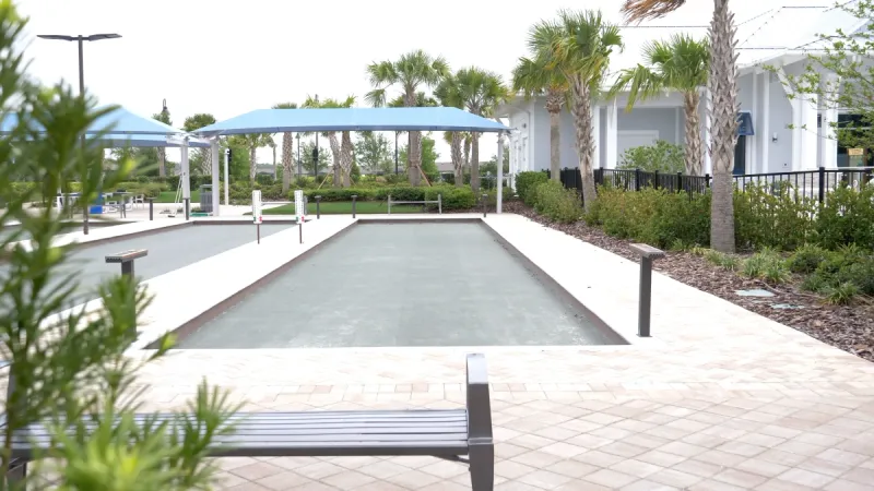 Bocce courts for friendly matches and seating areas for socializing.