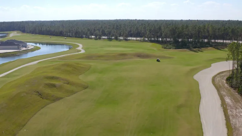 Aerial view of the meticulously cared for fairways at Stillwater by Lennar.
