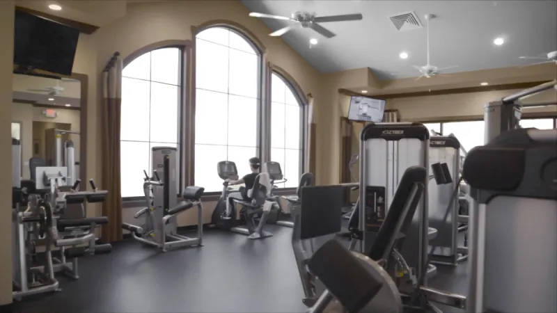 Well equipped gym with cardio and weight machines.