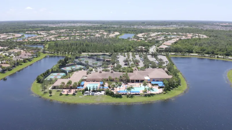 Aerial view of clubhouse and pool area.