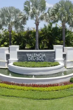 Valencia del Sol monument sign surrounded by beautiful landscaping.