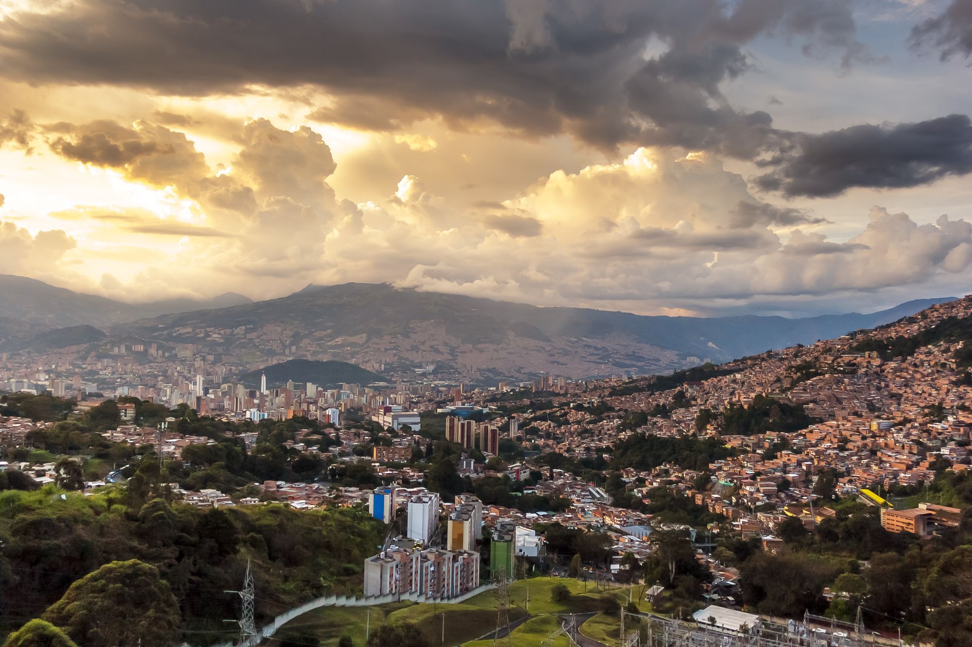 Sunset clouds over the Aburrá valley and the hillside neighbourhoods of Medellín.