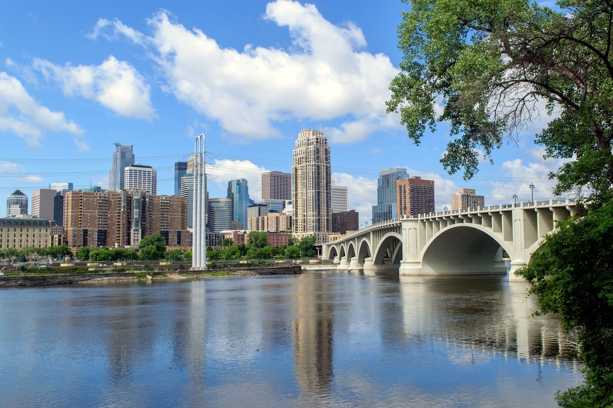 Downtown Minneapolis seen across the Mississippi River, with the Third Avenue Bridge on the right.