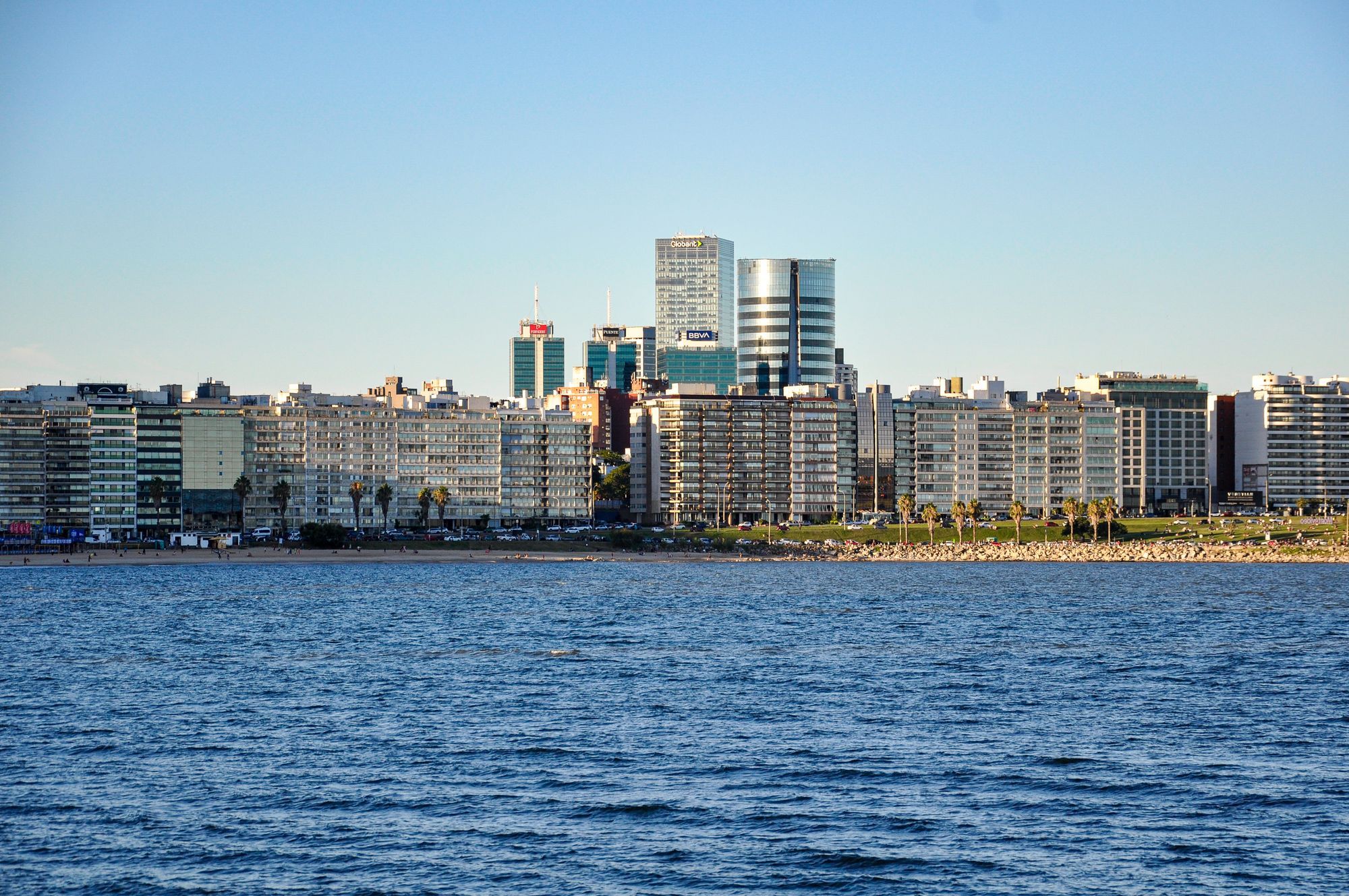 The apartment blocks and towers of the Montevideo waterfront across the water.
