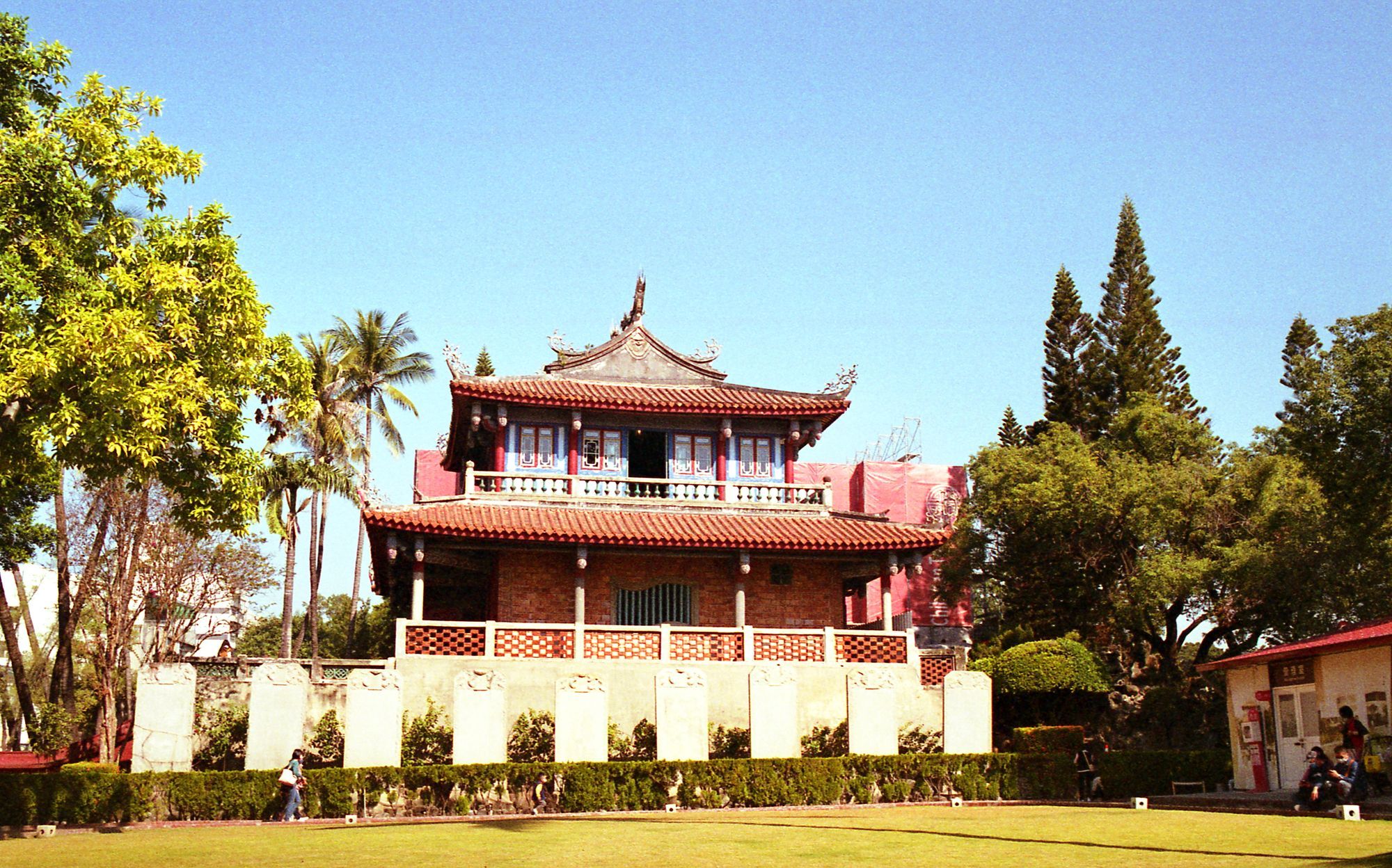 Chihkan Tower with its red tiled roofs among palms and pines in Tainan.