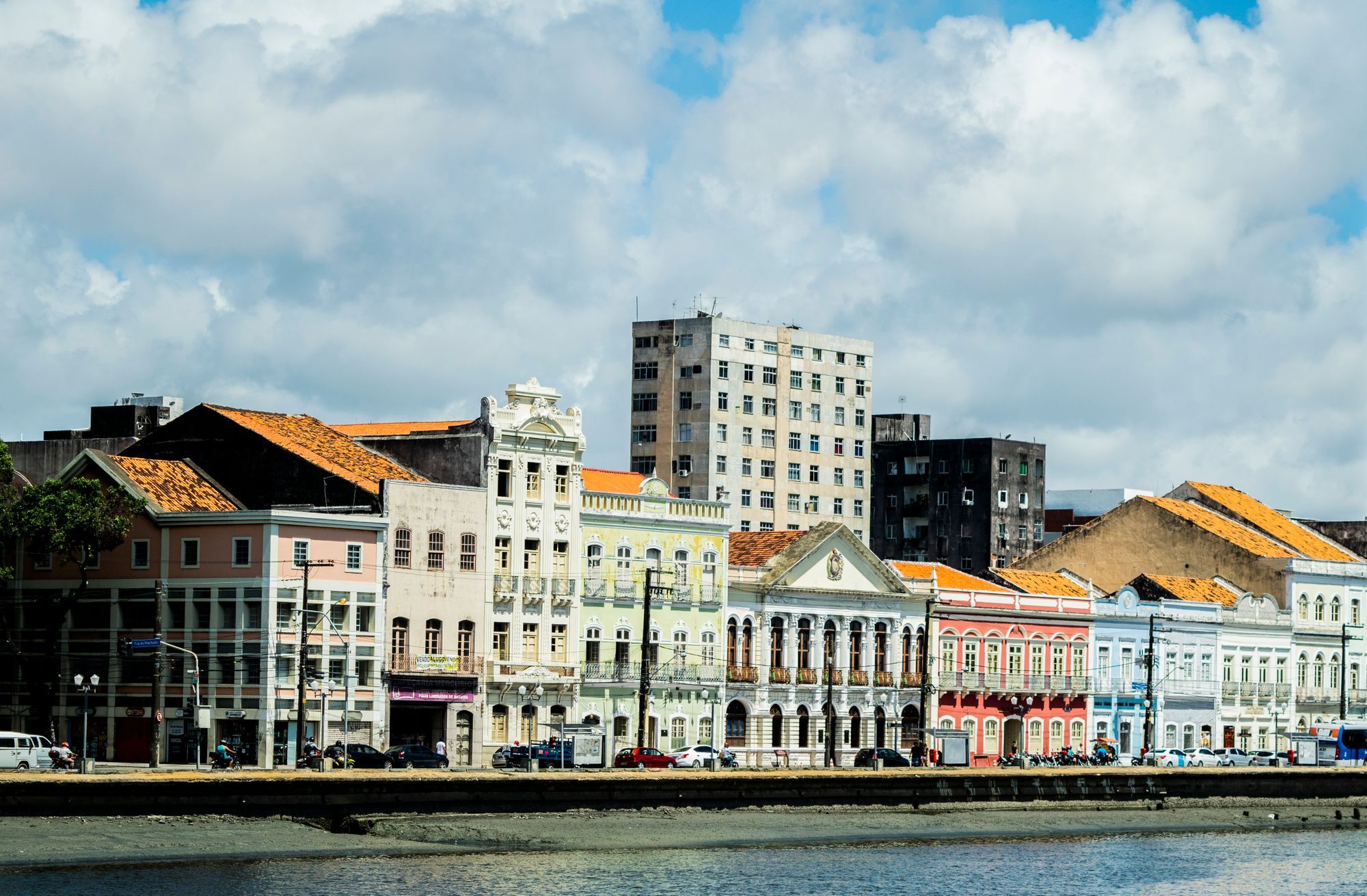 Colorful colonial buildings along the riverfront in the old center of Recife.
