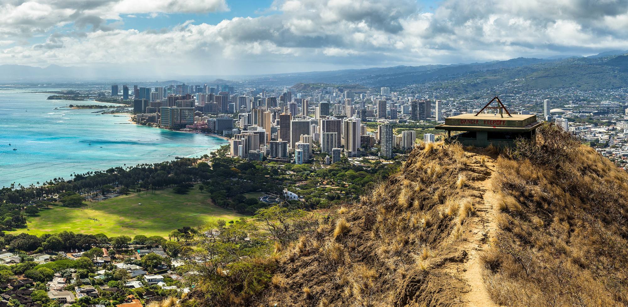 The Honolulu skyline and Waikiki coastline seen from the Diamond Head trail.