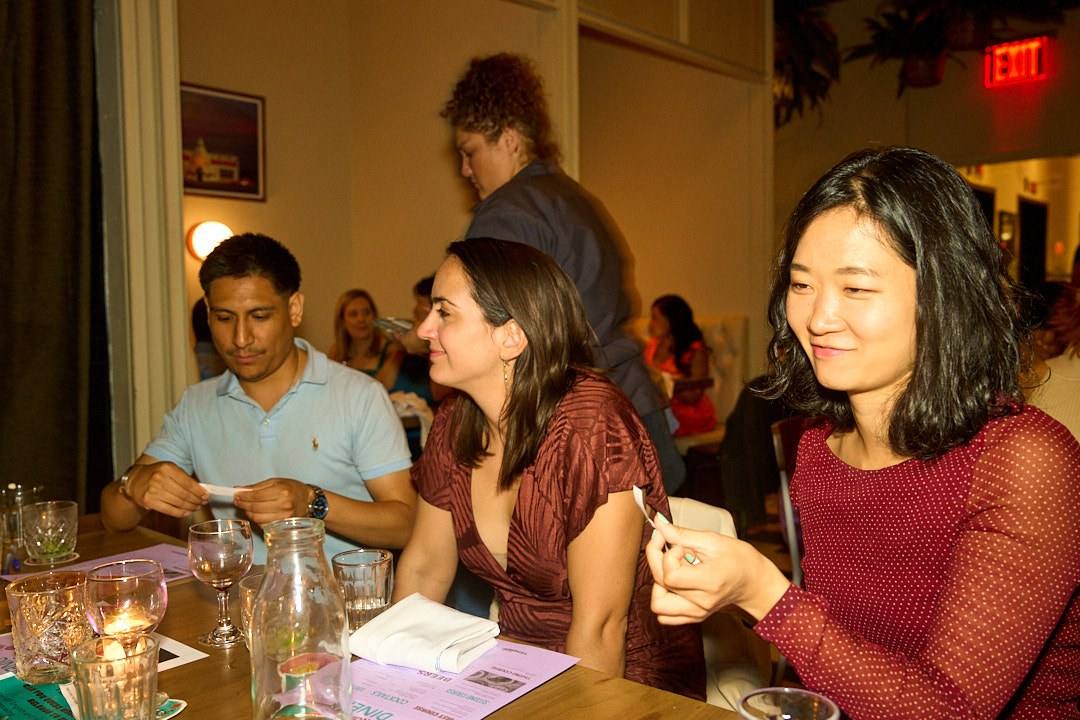 Guests mid-conversation at a Timeleft dinner table