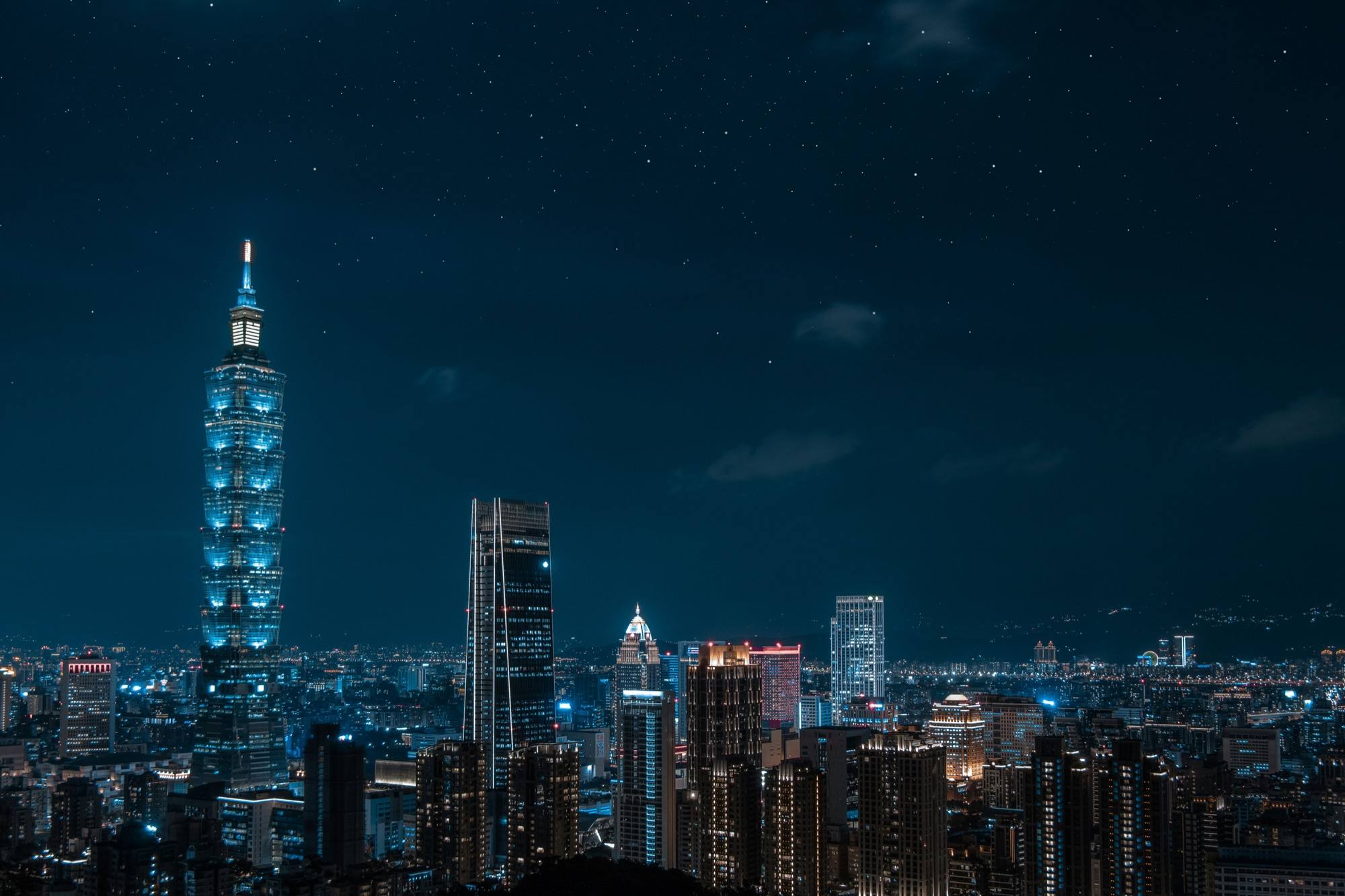Taipei 101 and the Taipei skyline lit up at night