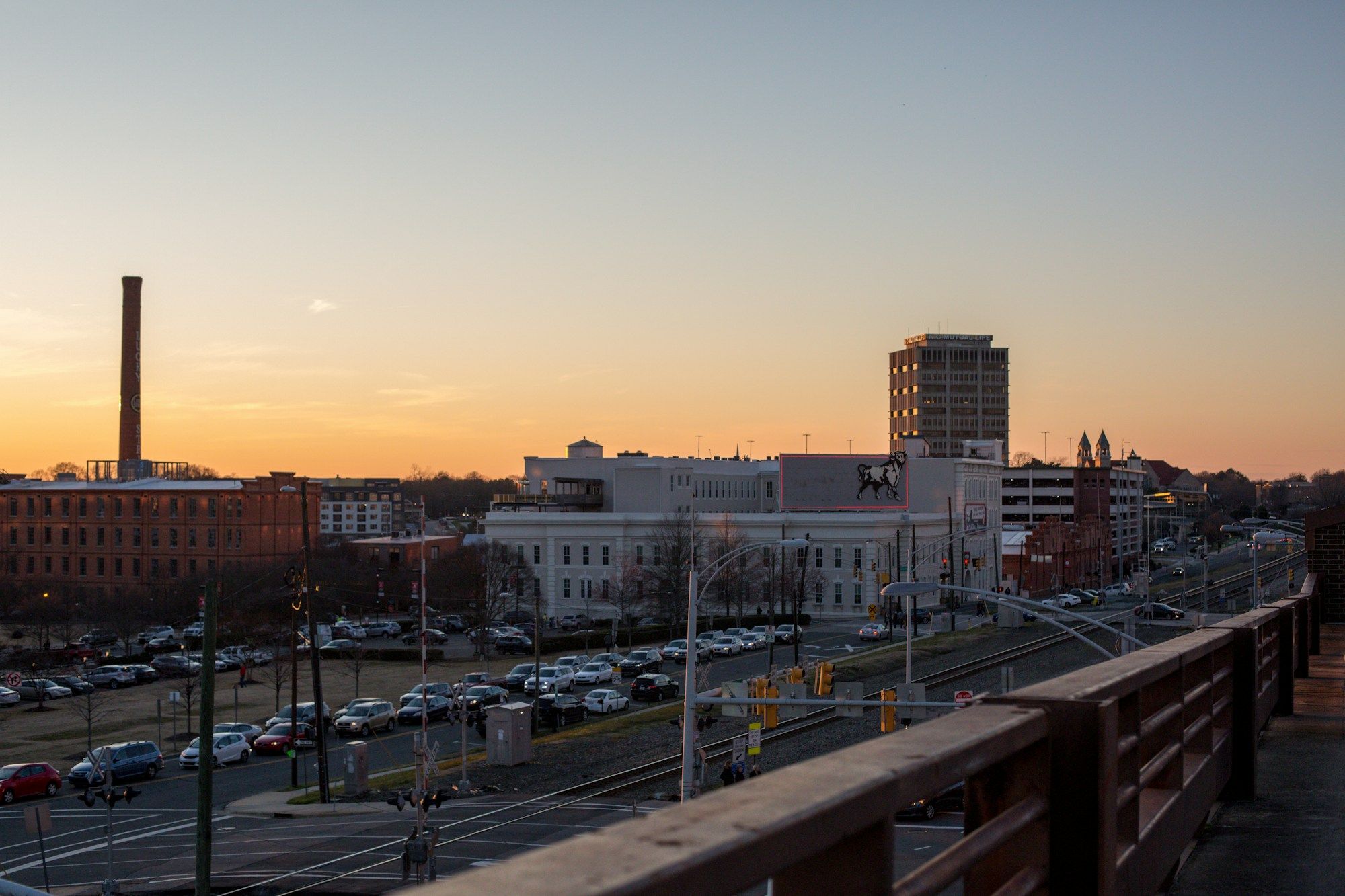 Downtown Durham at sunset seen from a bridge