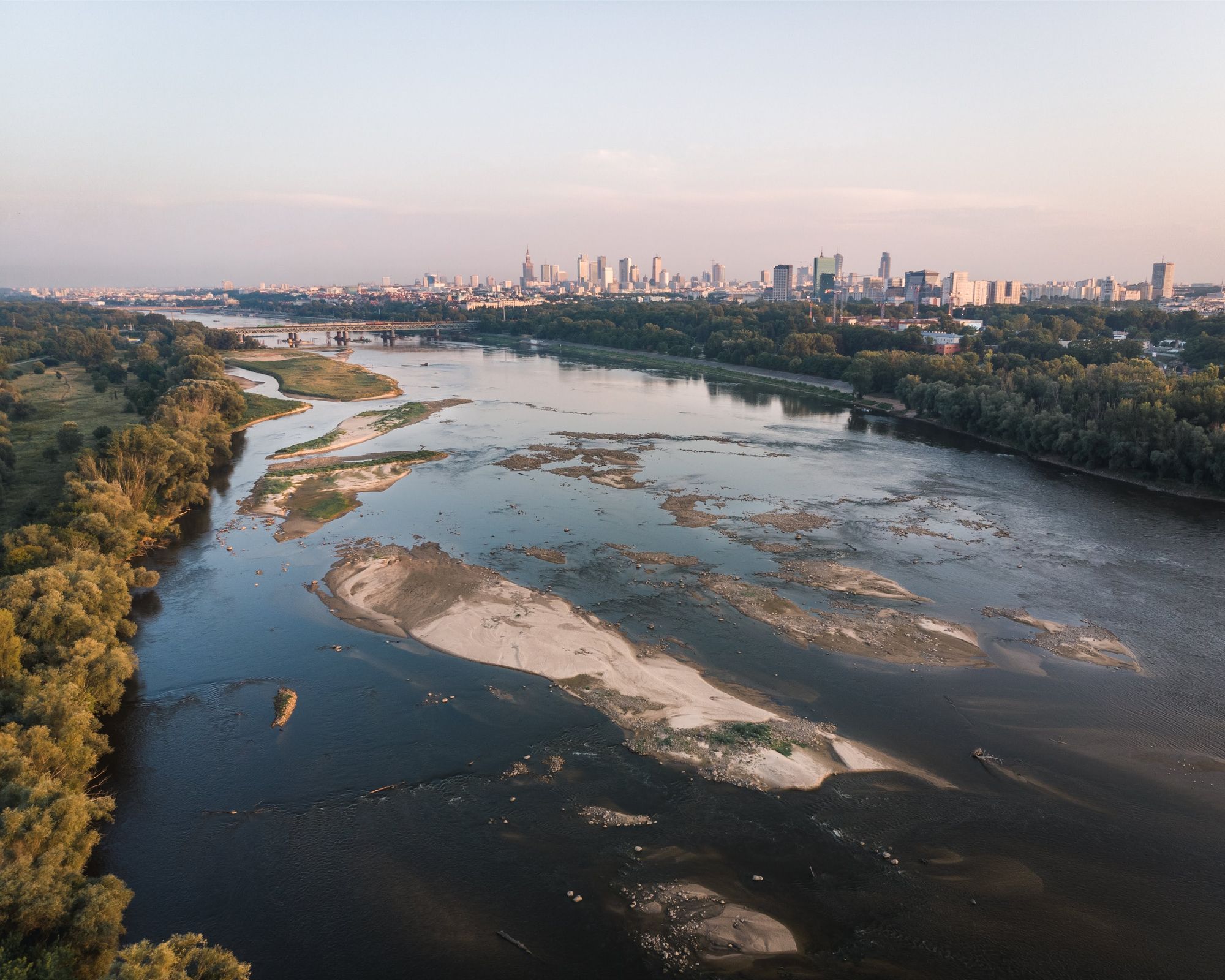 The Vistula river with sandbanks and the Warsaw skyline on the horizon.