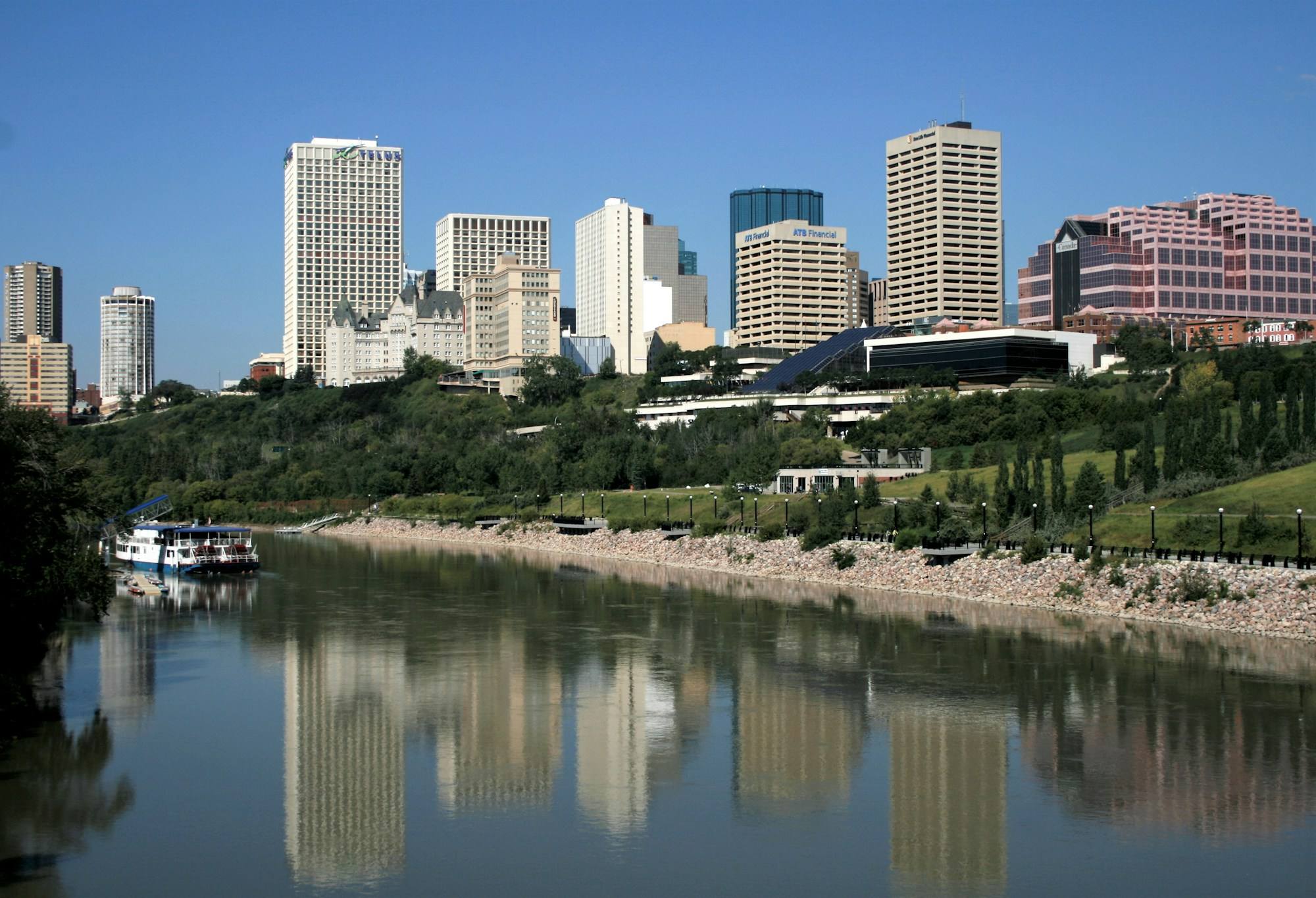 The Edmonton skyline above the North Saskatchewan River, reflected in the water