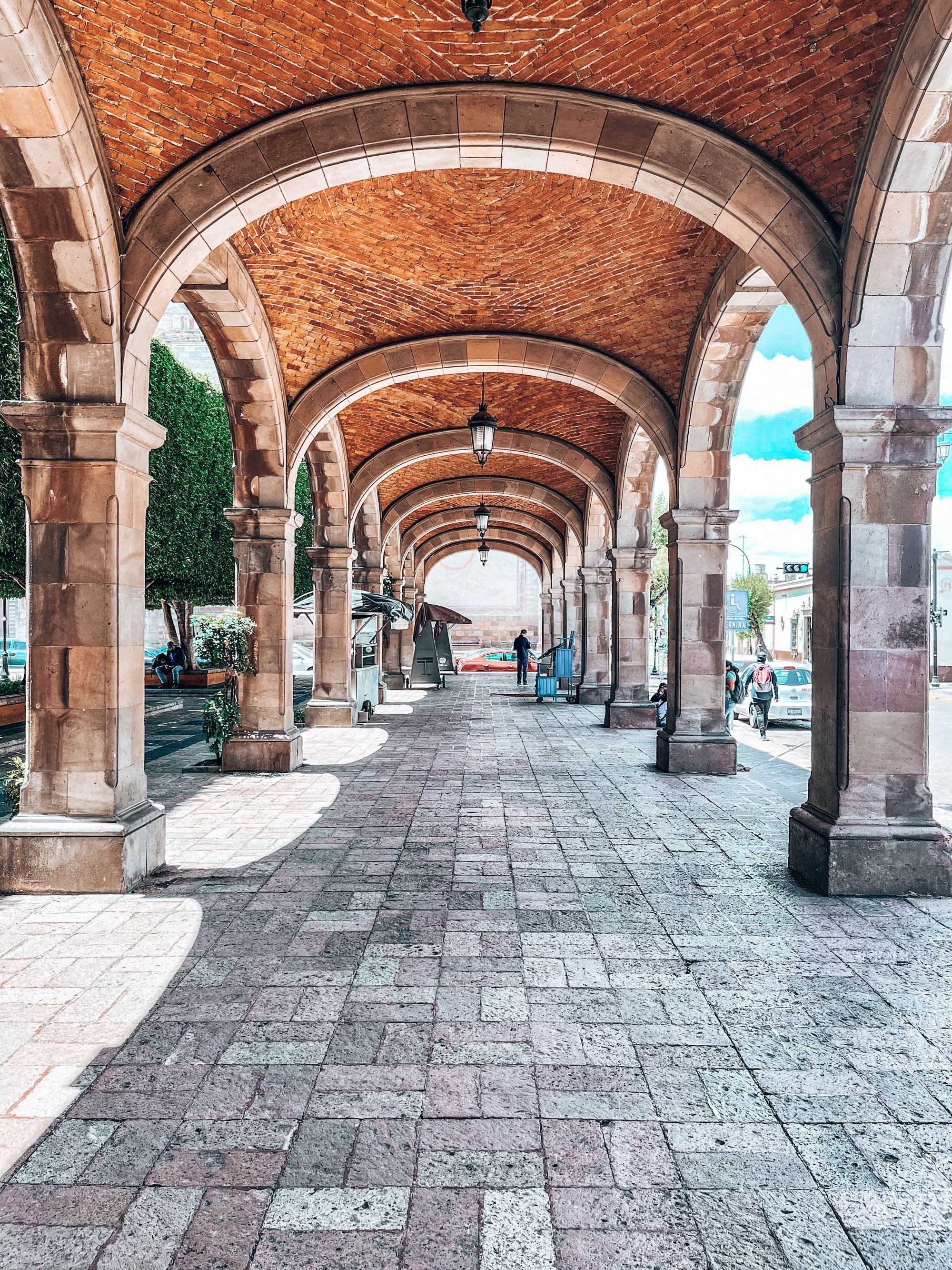 A stone arcade with brick vaults in the historic center of Querétaro.