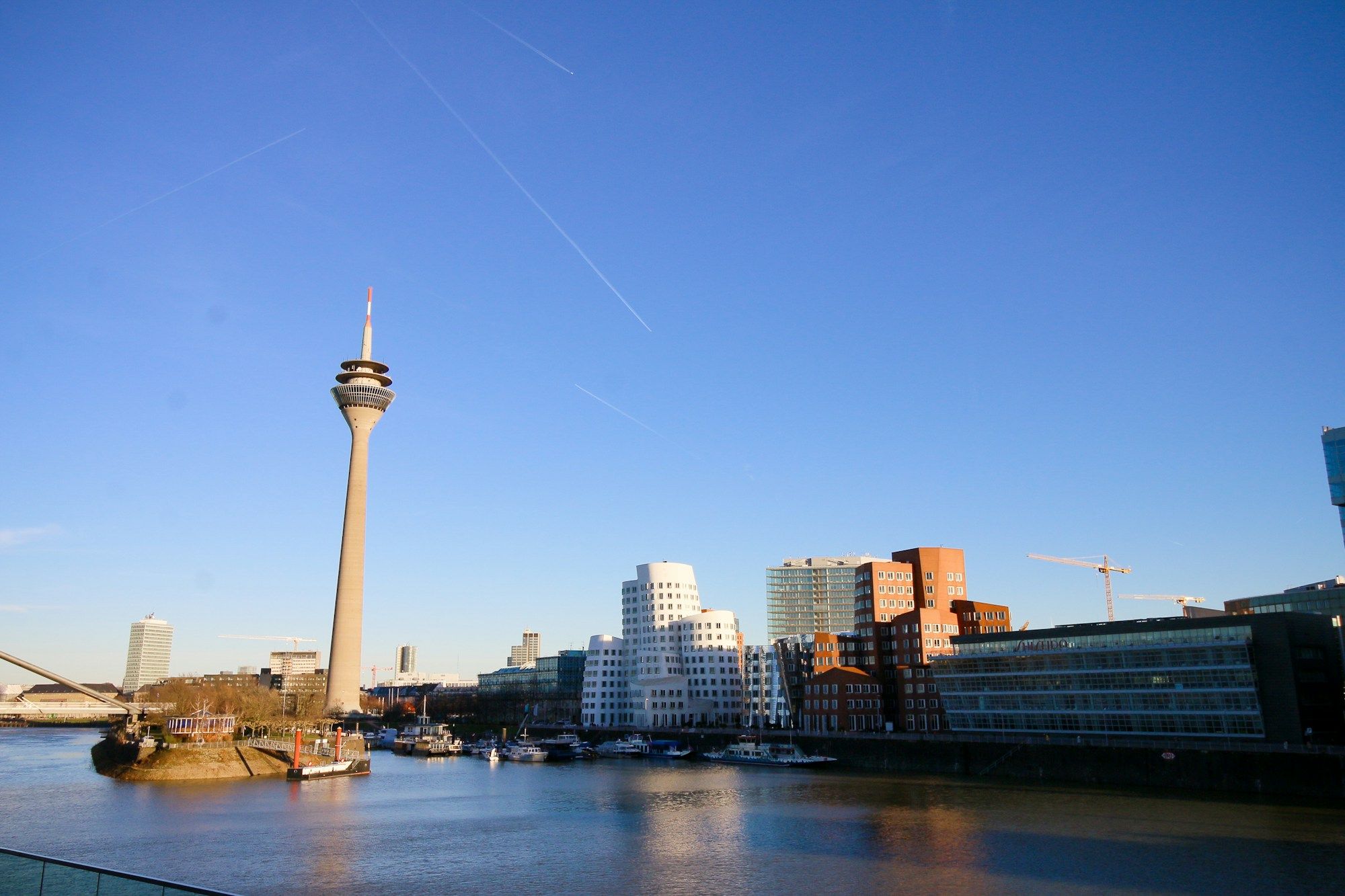 The Rheinturm and the Gehry buildings of the Medienhafen beside the Rhine in Düsseldorf