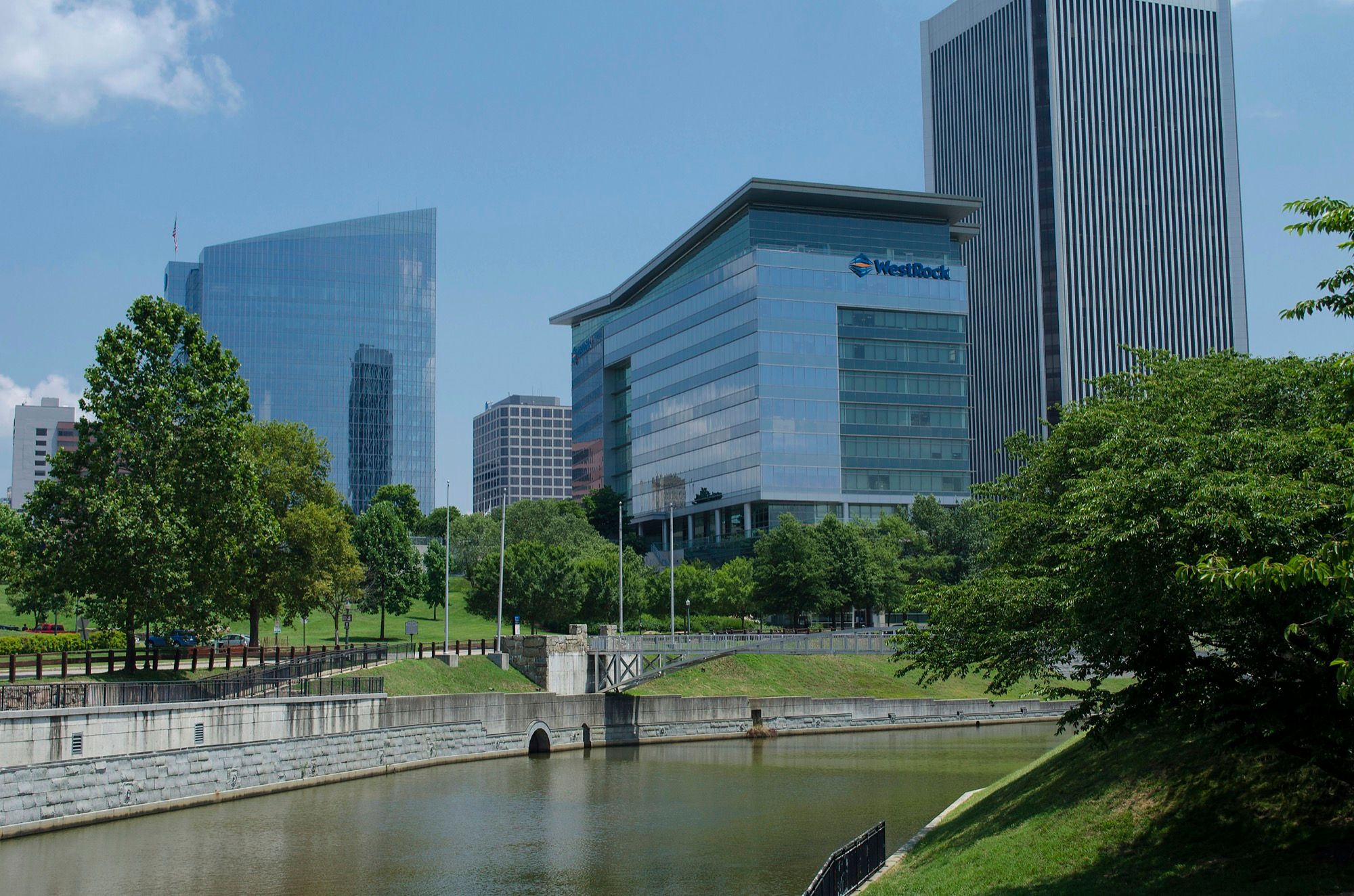 Trees along the canal in downtown Richmond, Virginia, with the business district beyond.