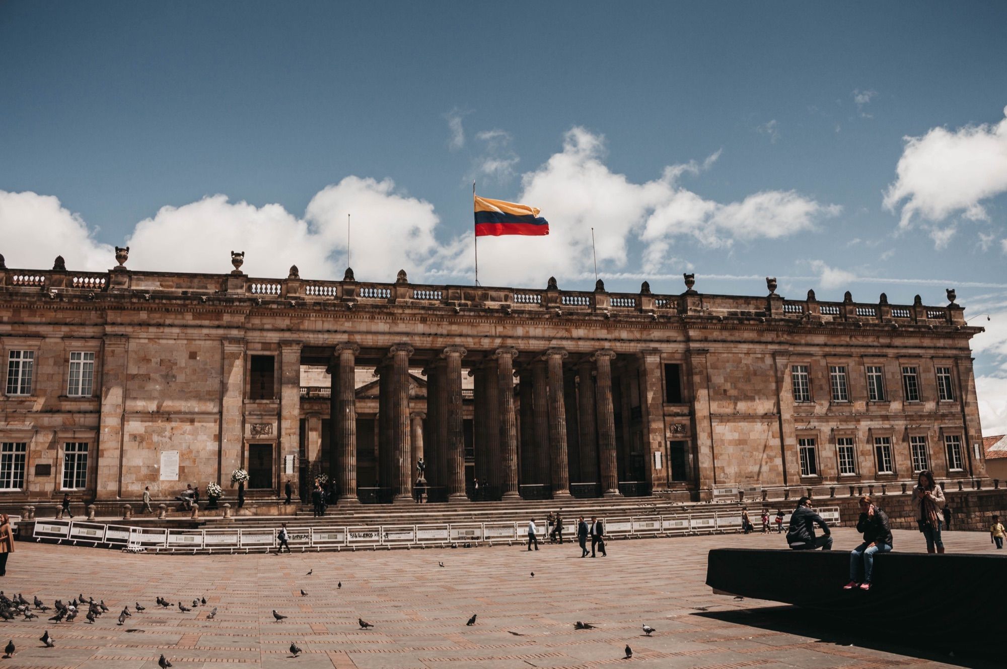 The Capitolio Nacional on Plaza de Bolívar in Bogotá, with the Colombian flag