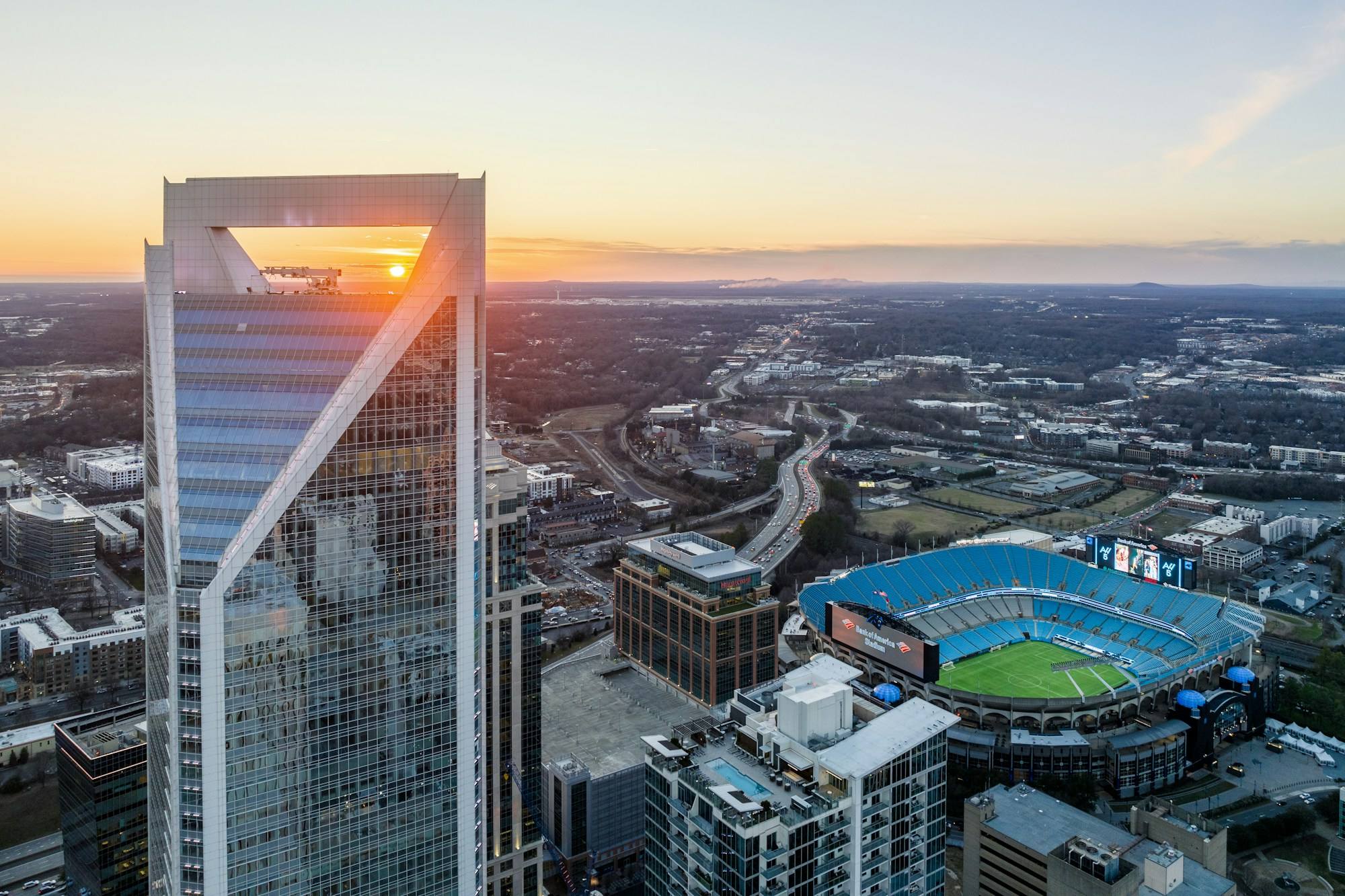 The Charlotte towers and the stadium at sunset, seen from above